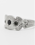 ring with black crystals in silver tone