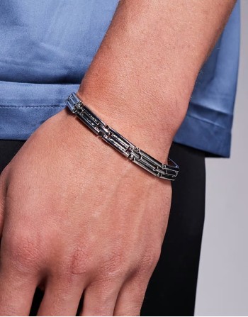 watch strap with embossed detail in silver tone