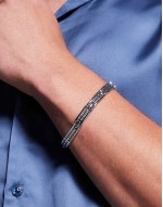 watch strap with embossed detail in silver tone