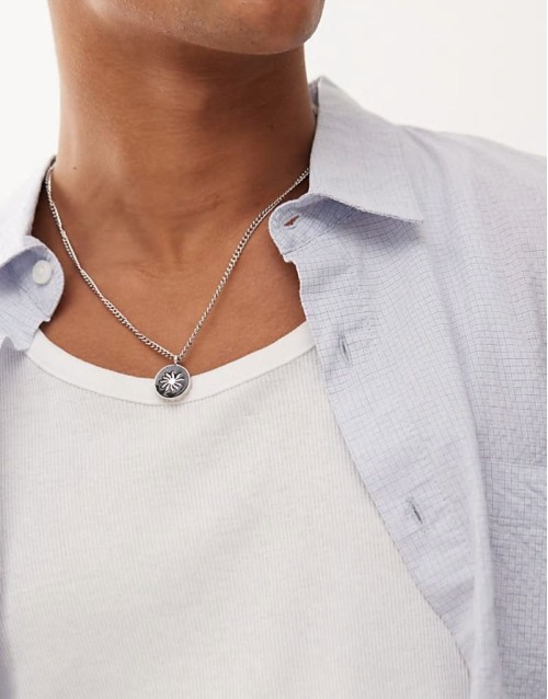 sun engraved pendant necklace in black and silver