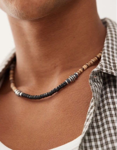 beaded necklace with metal charms in navy blue